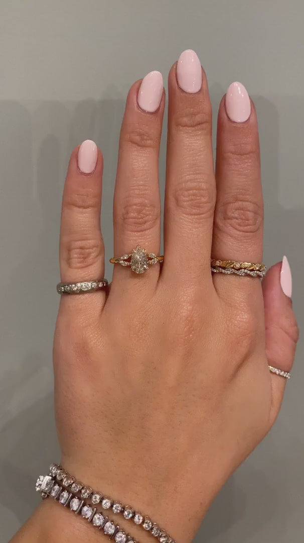 caption:Shown with 1.0ct pear diamond in yellow gold