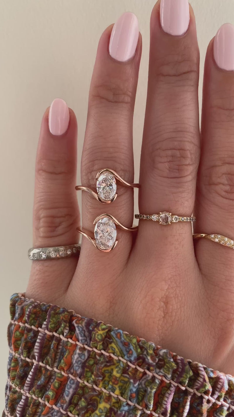 caption:Shown with 1.5ct & 1ct oval diamonds in 14k rose gold 