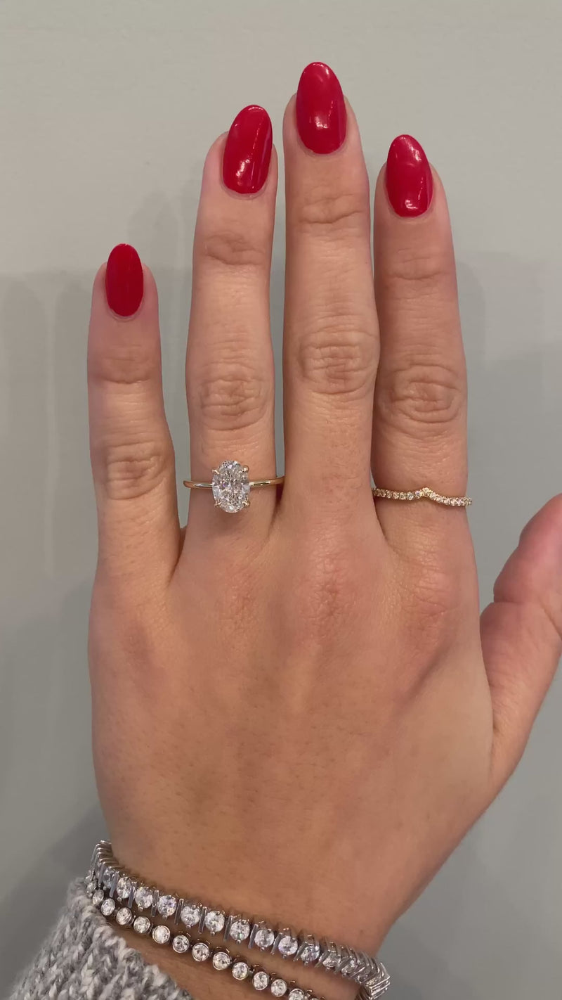 caption:Shown with 1.5ct oval cut diamond 