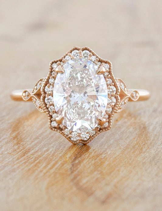 caption:Shown with 2.50ct oval diamond in 14k rose
        gold 