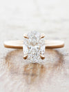 caption:Shown with 2ct oval in 14k rose, customized 2mm band 