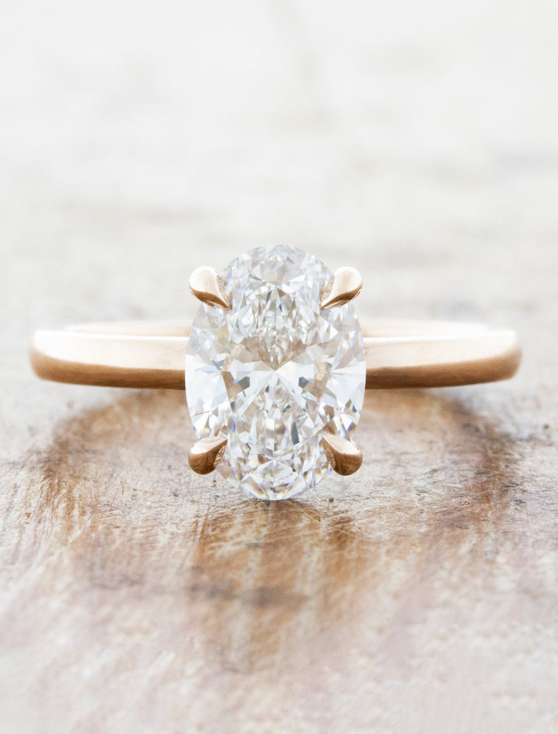 caption:Shown with 2ct oval in 14k rose, customized 2mm band 