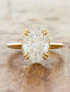 caption:Shown with 3ct oval diamond customized with non-leaf double claw prongs in 14k yellow gold 