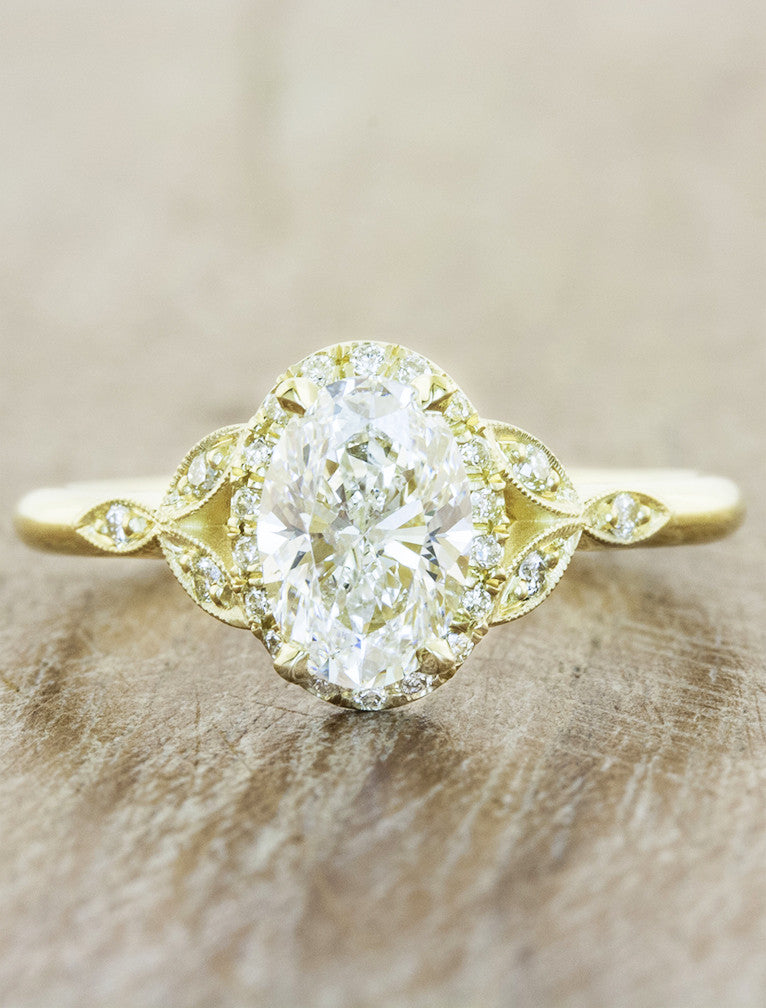 caption:Shown with 1.00ct oval diamond in 18k yellow gold