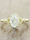 caption:Shown with 1.00ct oval diamond in 18k yellow gold