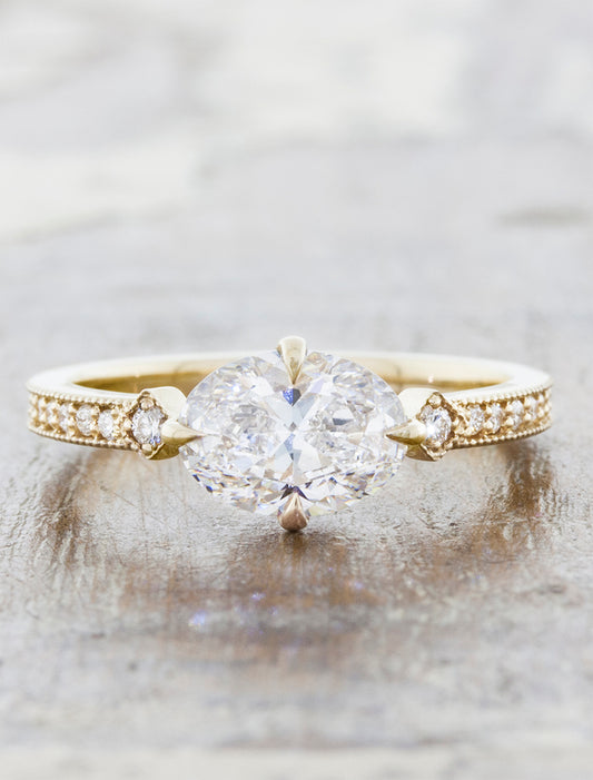 caption:Shown with 1.20ct oval diamond in 14k yellow gold