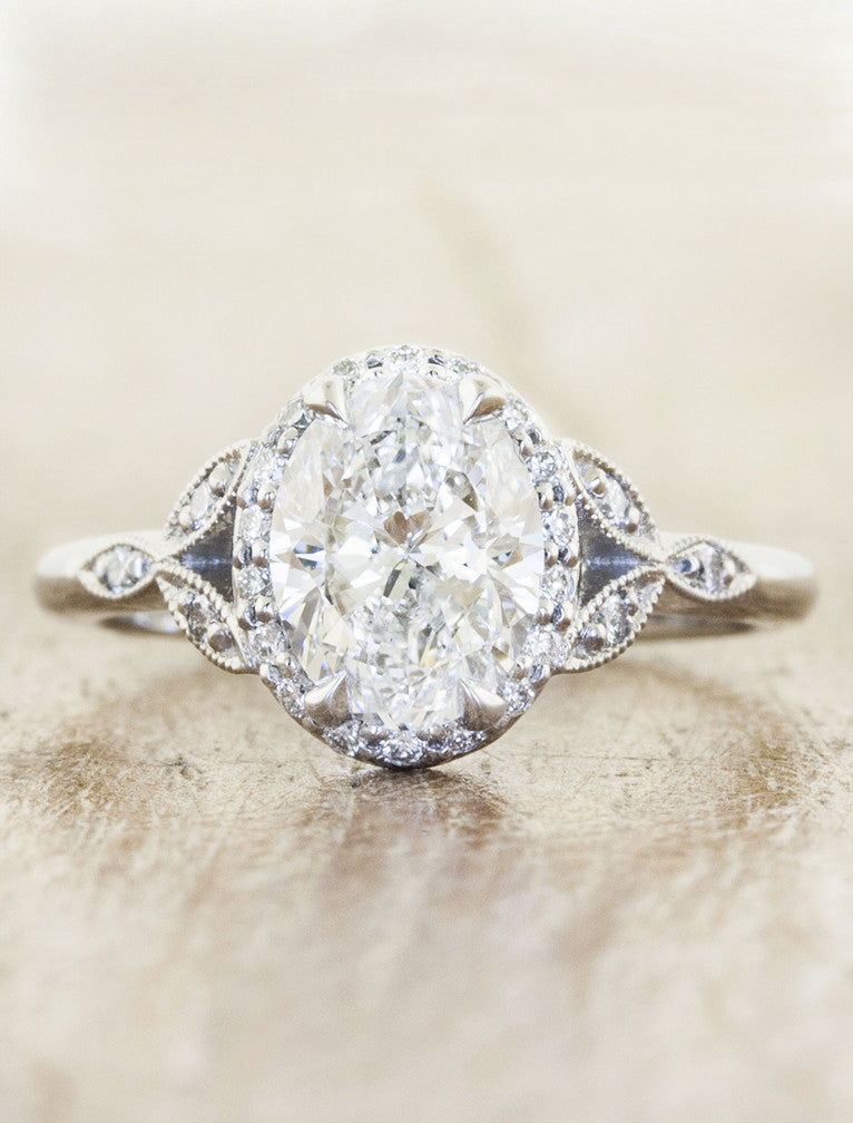 caption:Shown with 1.70ct. oval diamond in platinum 