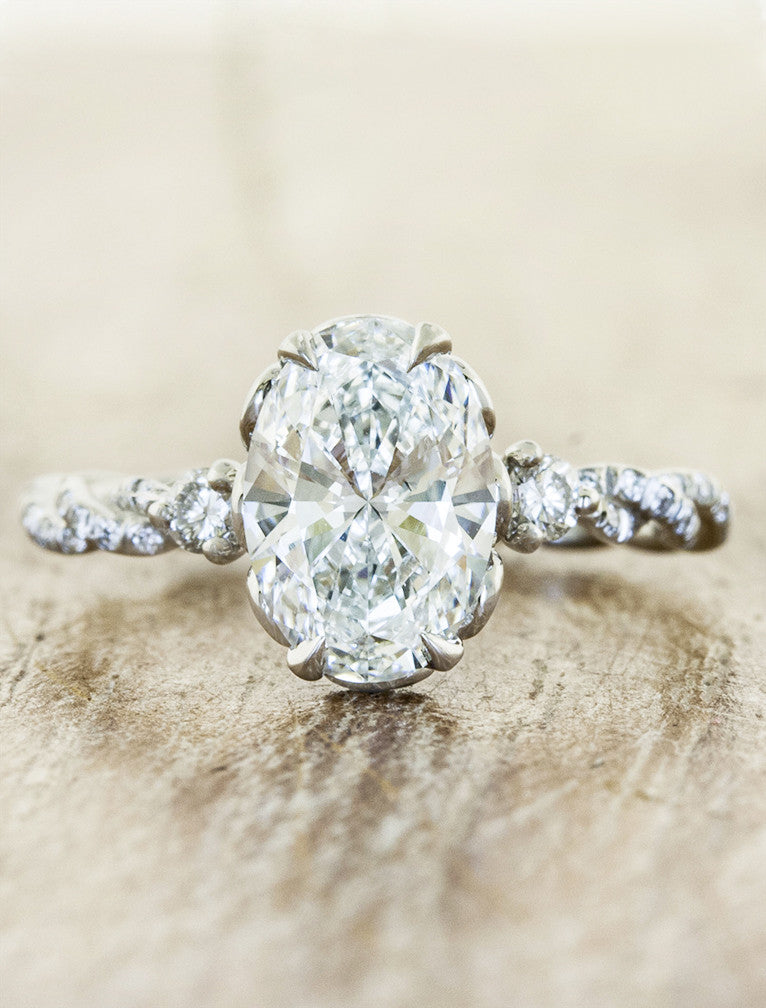caption:Shown with 1.50ct oval diamond in platinum 
