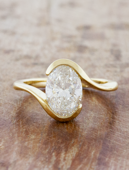 caption:Salom&eacute; engagement ring with 2ct oval diamond in 14k yellow gold